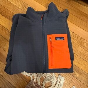 Patagonia Black Fleece Jacket with Orange Chest Pocket men large